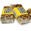Two Original Big Sur Bars, yellow labels, almonds, pecans, raisins, coconut, semi-sweet chocolate, honey, oatmeal. All Natural. No additives or preservatives.