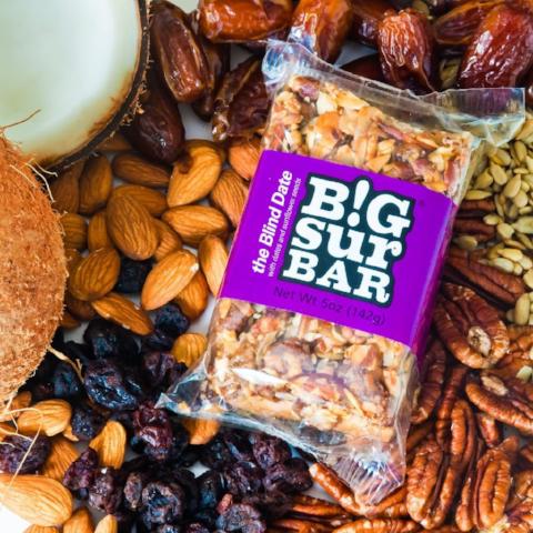 Blind Date Bar purple label dates, sunflower seeds, pecans, almonds, coconut, honey, oatmeal. All Natural. No additives or preservatives.